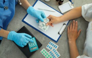 The doctor is given illegal money, the concept of corruption in medicine.