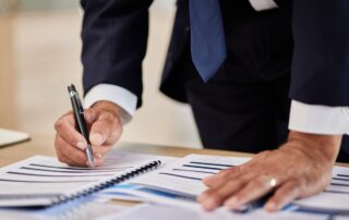 Divorce paperwork, hands and person sign legal contract, rules documents or closeup asset agreement