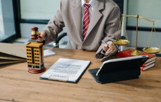 Real Esuse model, hammer judge gavel on table with white background. Foreclosure, bankruptcy concept
