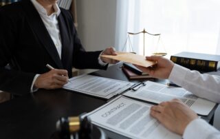 Businessman bribes officials or lawyers to commit corruption in lawsuits Unlawful acts of law enforc